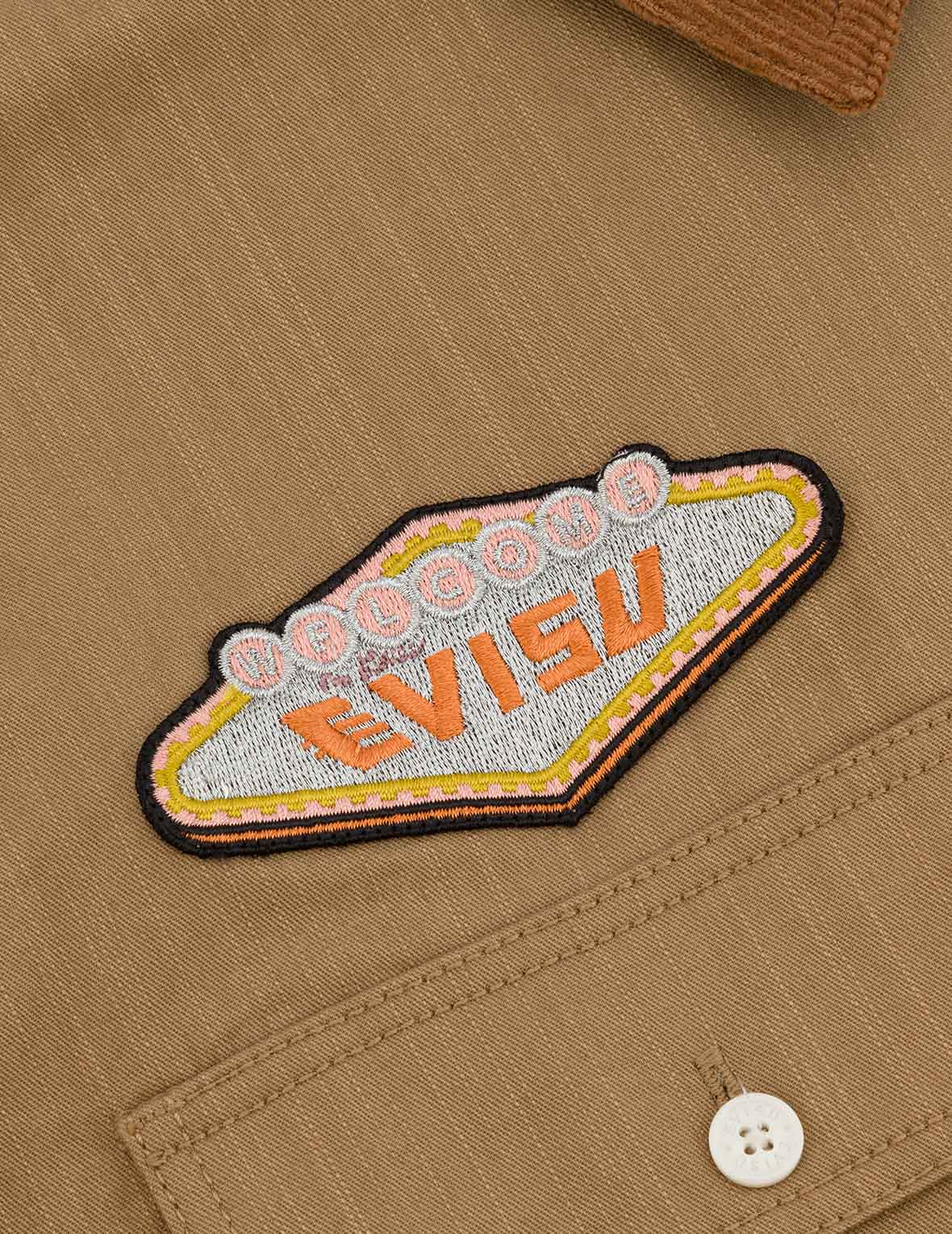 ロゴ刺繍とマルチポケットリラックスフィット長袖シャツ
