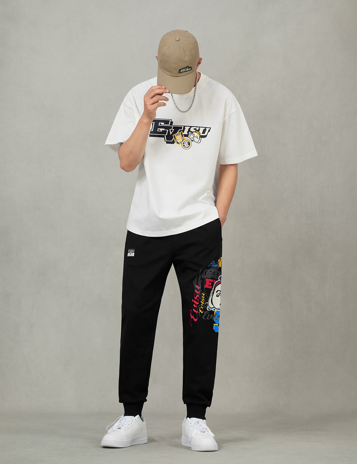 へのへのもへじ仏頭と知恵の輪タグ 大黒プリント リラックスフィット Tシャツ