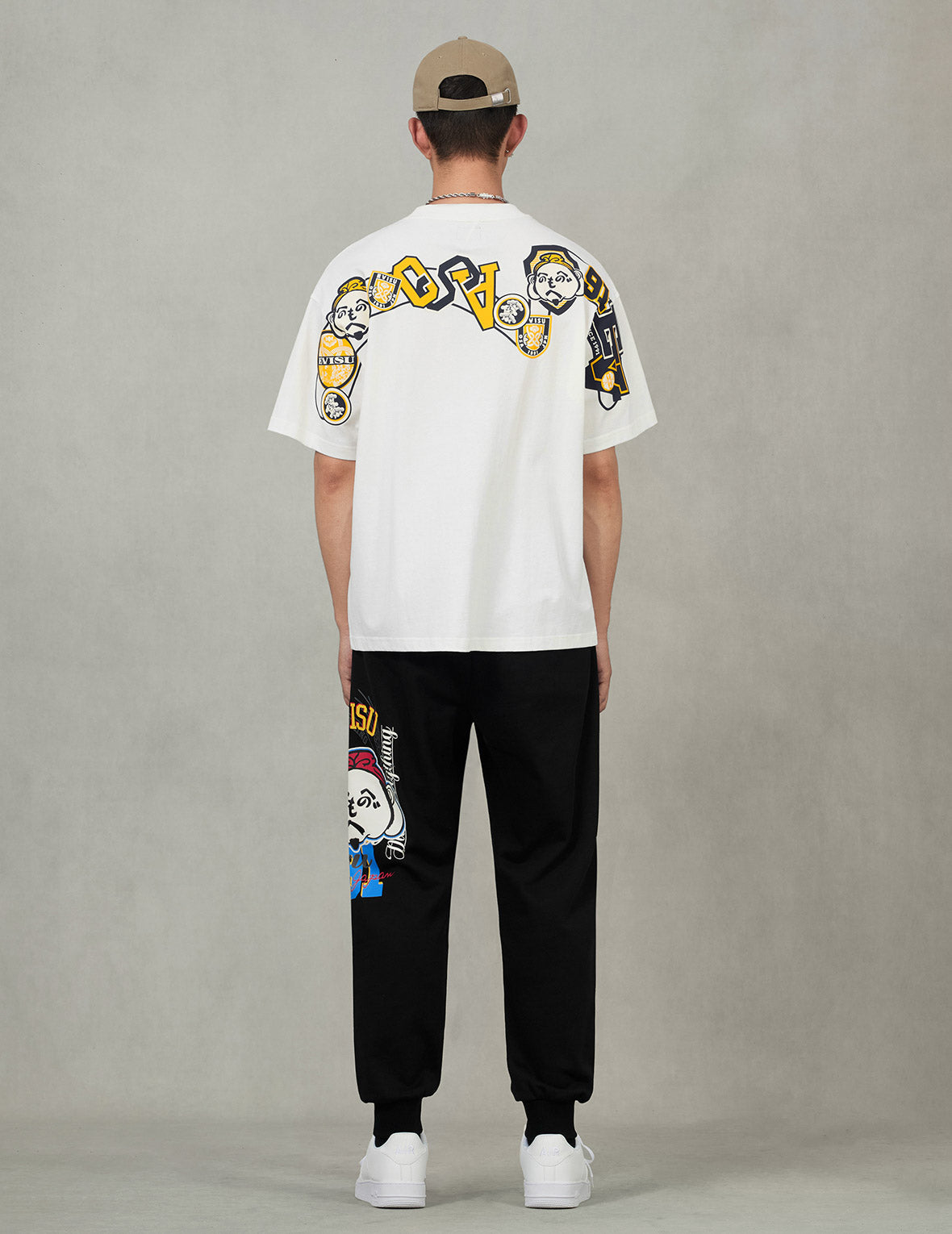へのへのもへじ仏頭と知恵の輪タグ 大黒プリント リラックスフィット Tシャツ