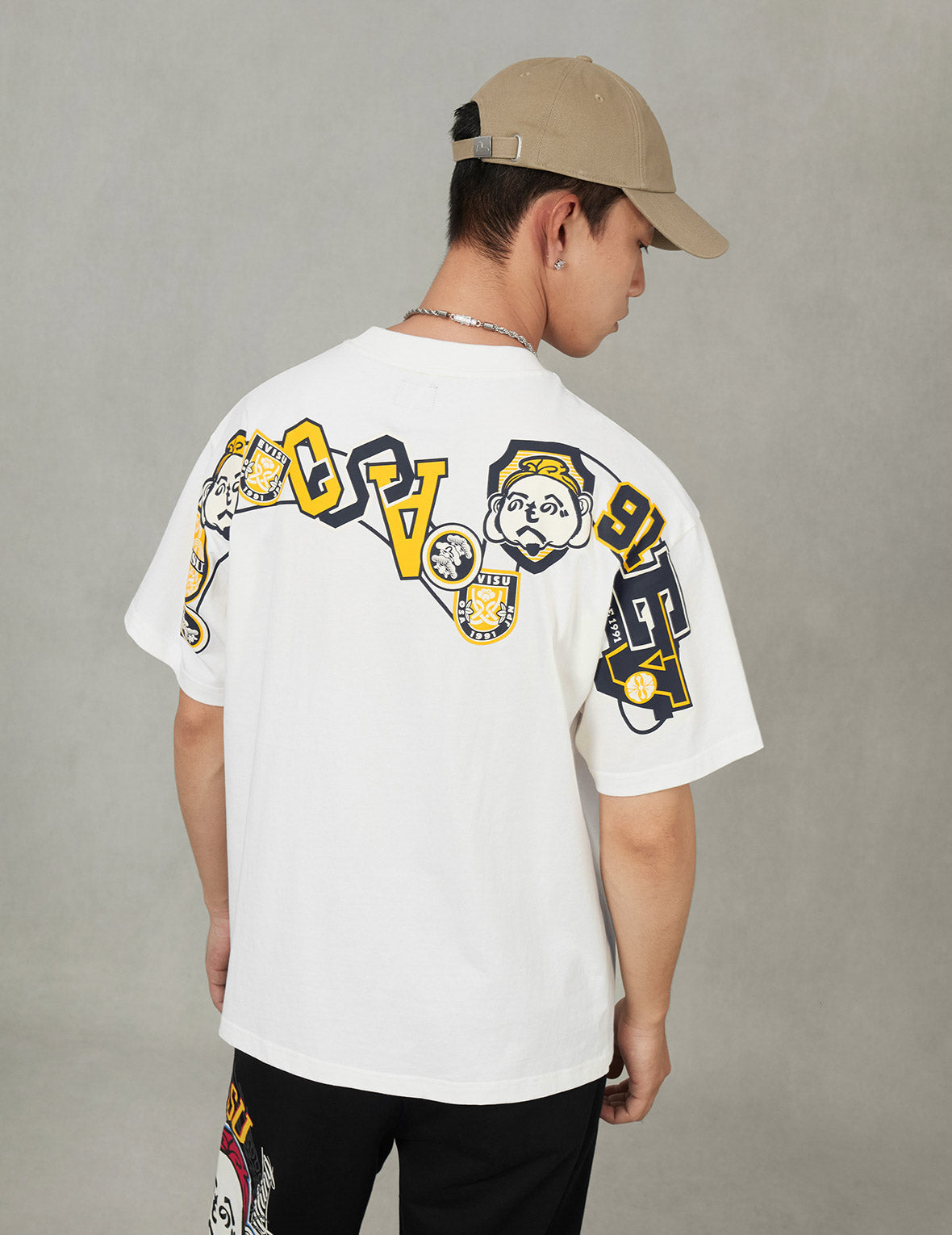 へのへのもへじ仏頭と知恵の輪タグ 大黒プリント リラックスフィット Tシャツ