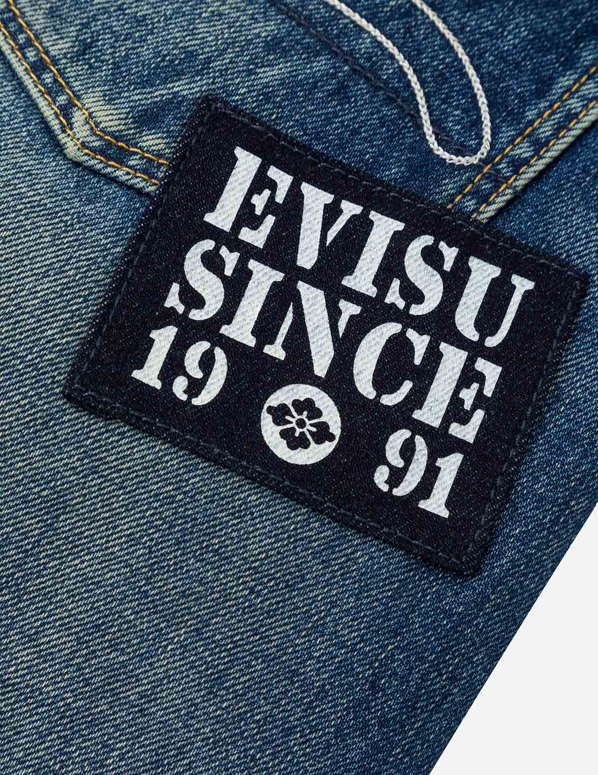 カモメ刺繍と「EVISU SINCE 1991」プリントパッチ キャロットフィット ジーンズ #2017