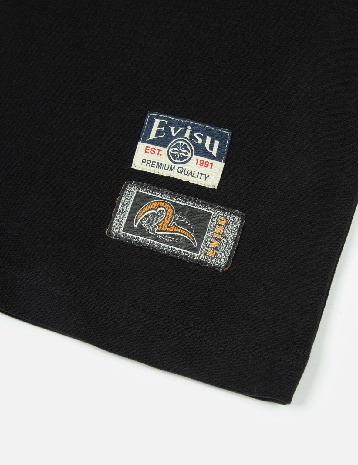 ポケット型のだるま大黒プリントリラックスフィットTシャツ