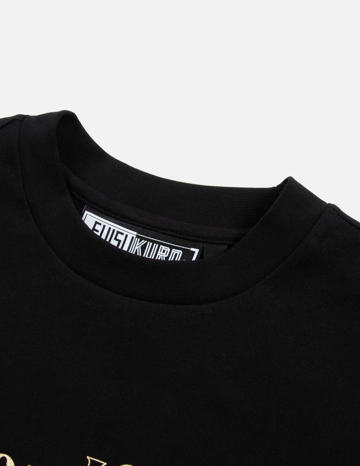 ゴールド箔のカリグラフィロゴプリントのオーバーサイズTシャツ