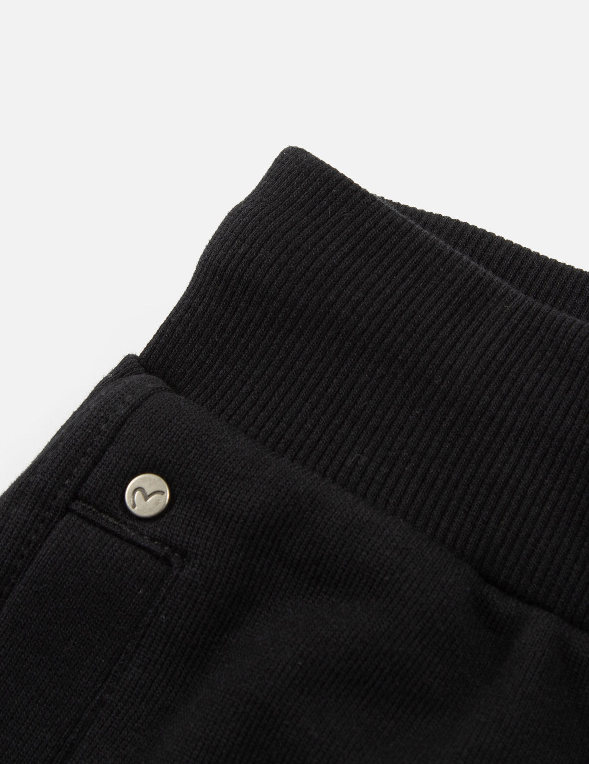 手縫いとマルチプリントのリラックスフィットスウェットパンツ