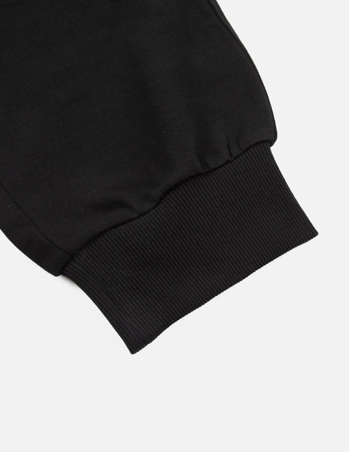 手縫いとマルチプリントのリラックスフィットスウェットパンツ