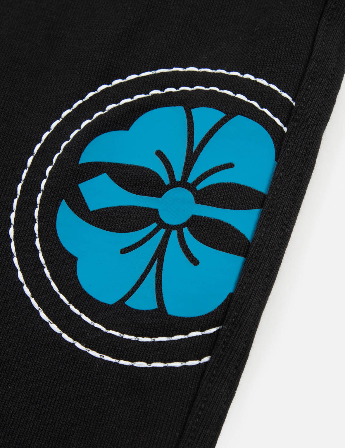 手縫いとマルチプリントのリラックスフィットスウェットパンツ