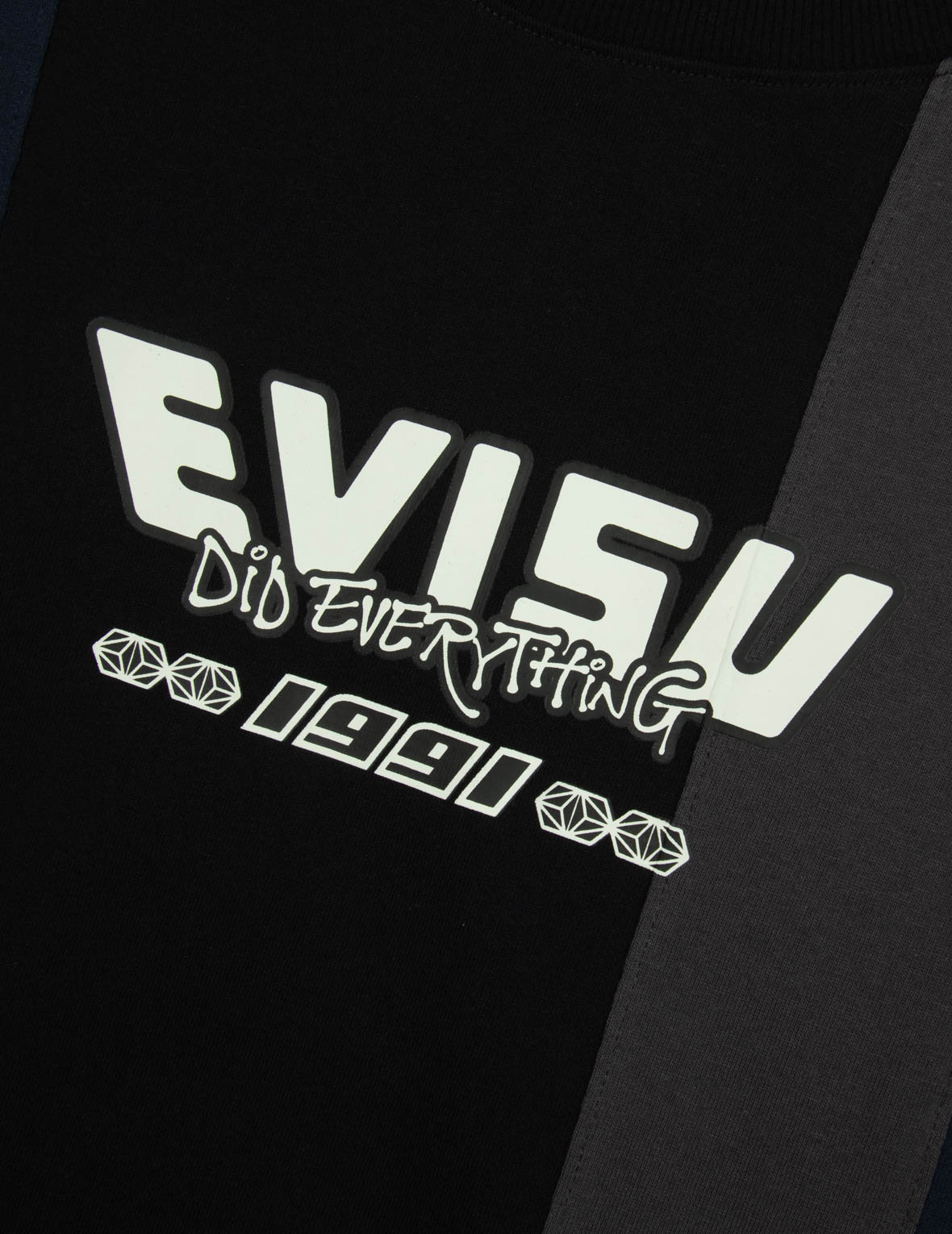 デコンストラクト遊び心ゴッドヘッドプリントのルーズフィットTシャツ