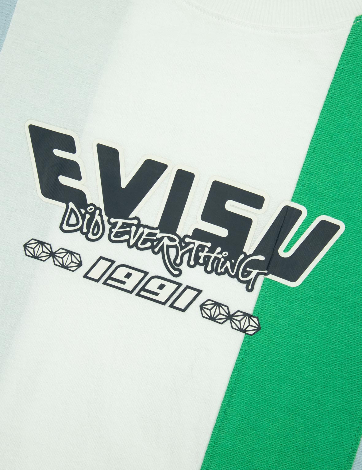 デコンストラクト遊び心ゴッドヘッドプリントのルーズフィットTシャツ
