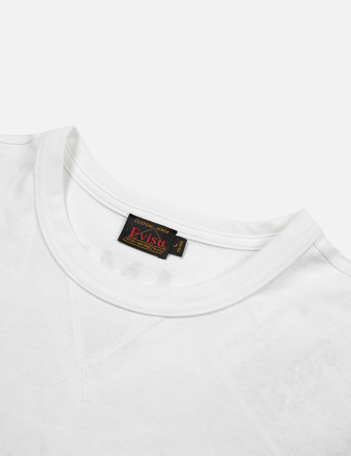 ロゴ刺繍とマルチプリントルーズフィットTシャツ