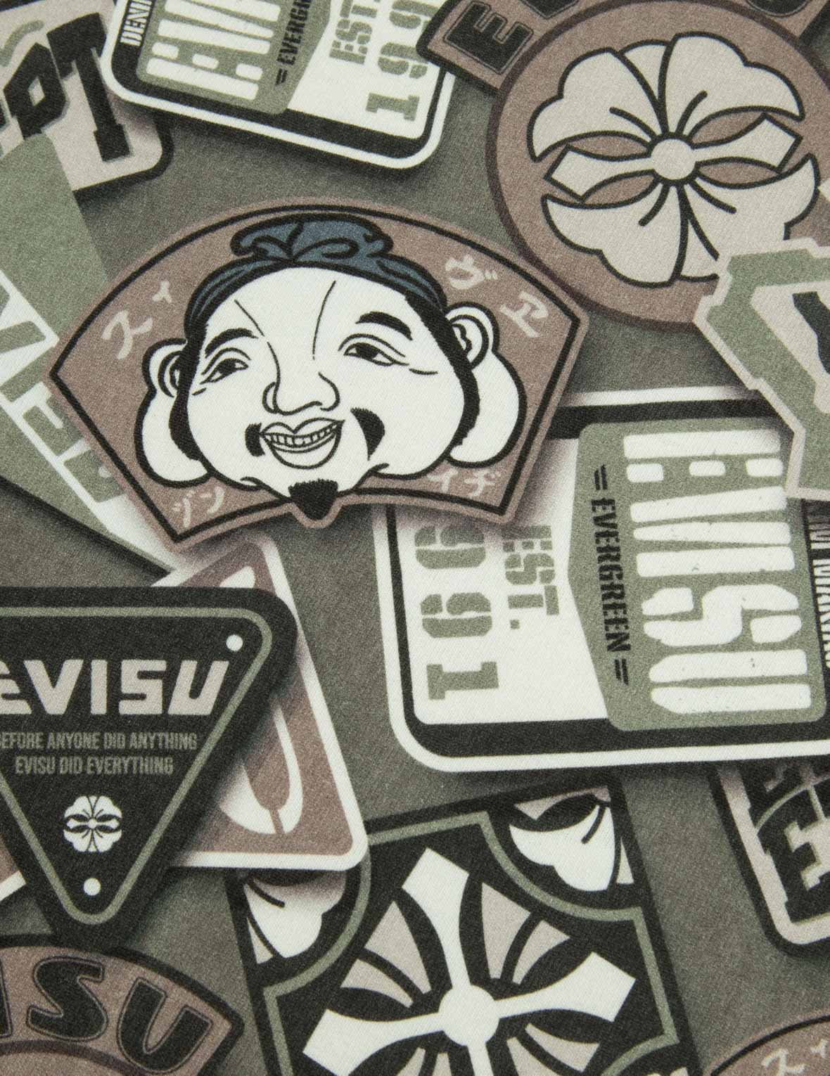 オールオーバーバッジプリントルーズフィットTシャツ